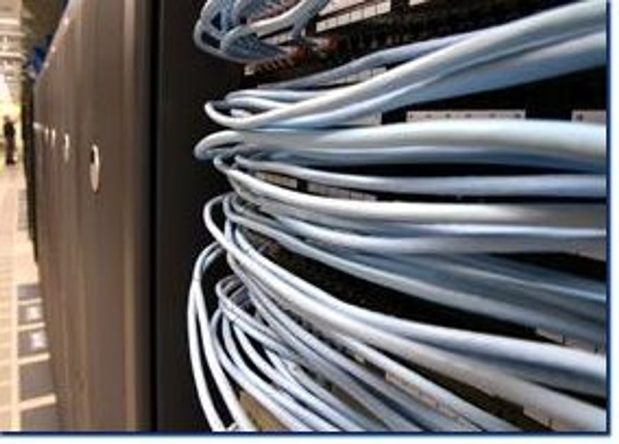 Network cabling running into a rack of business servers